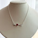 COLLAR FLECHA ROJO