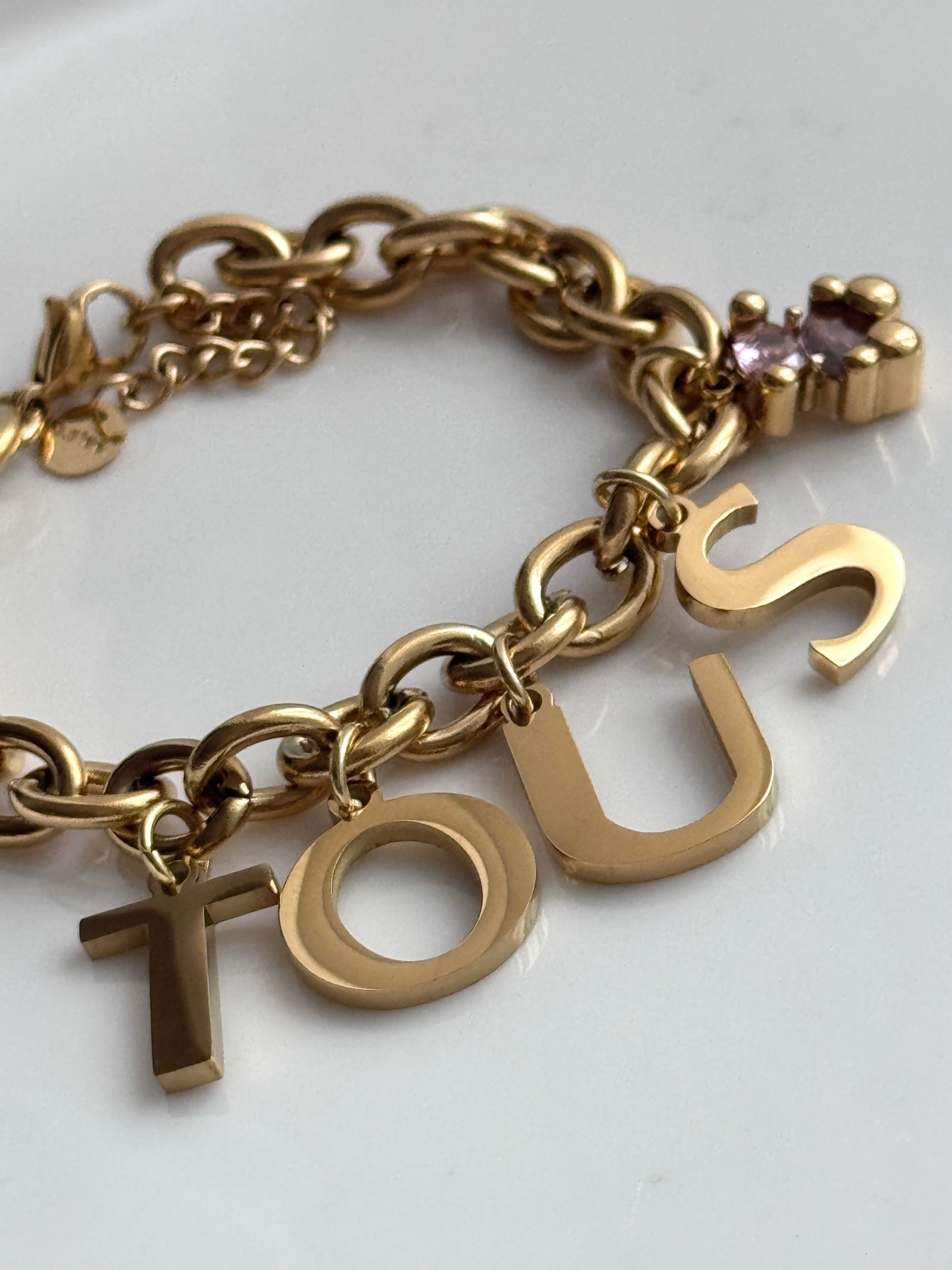 PULSERA LETRAS OSO ROSA