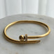 BRAZALETE CLAVO CON BOLITA Y ZIRCONIAS