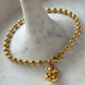 PULSERA BOLITAS CON OSO