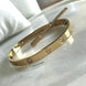 BRAZALETE LOVE CUATRO ZIRCONIAS