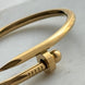 BRAZALETE CLAVO CON BOLITA LISA