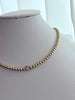 COLLAR BOLITAS CON ZIRCONIA DORADO