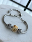 PULSERA CON CHARMS