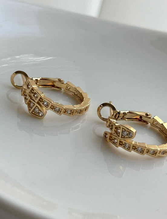 ARRACADA  SERPIENTE CON CRISTAL
