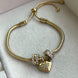 PULSERA CON CHARMS