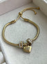 PULSERA CON CHARMS