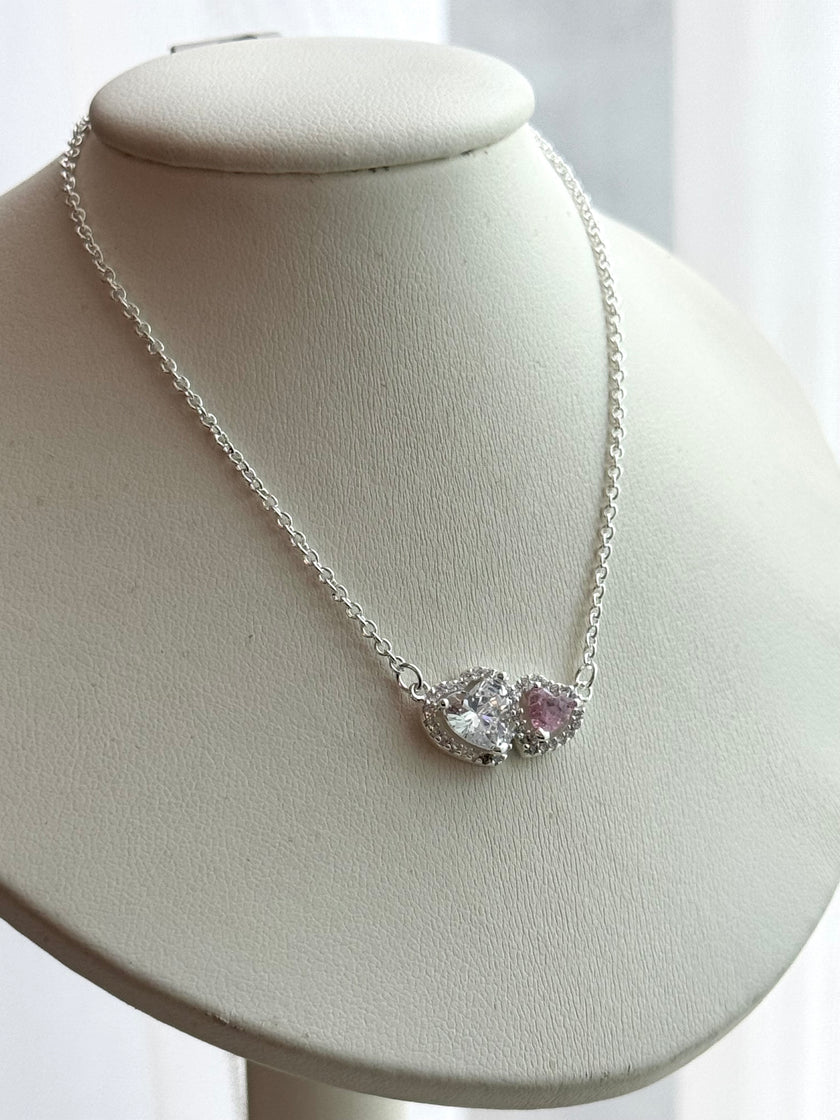 COLLAR DOBLE CORAZON ROSA