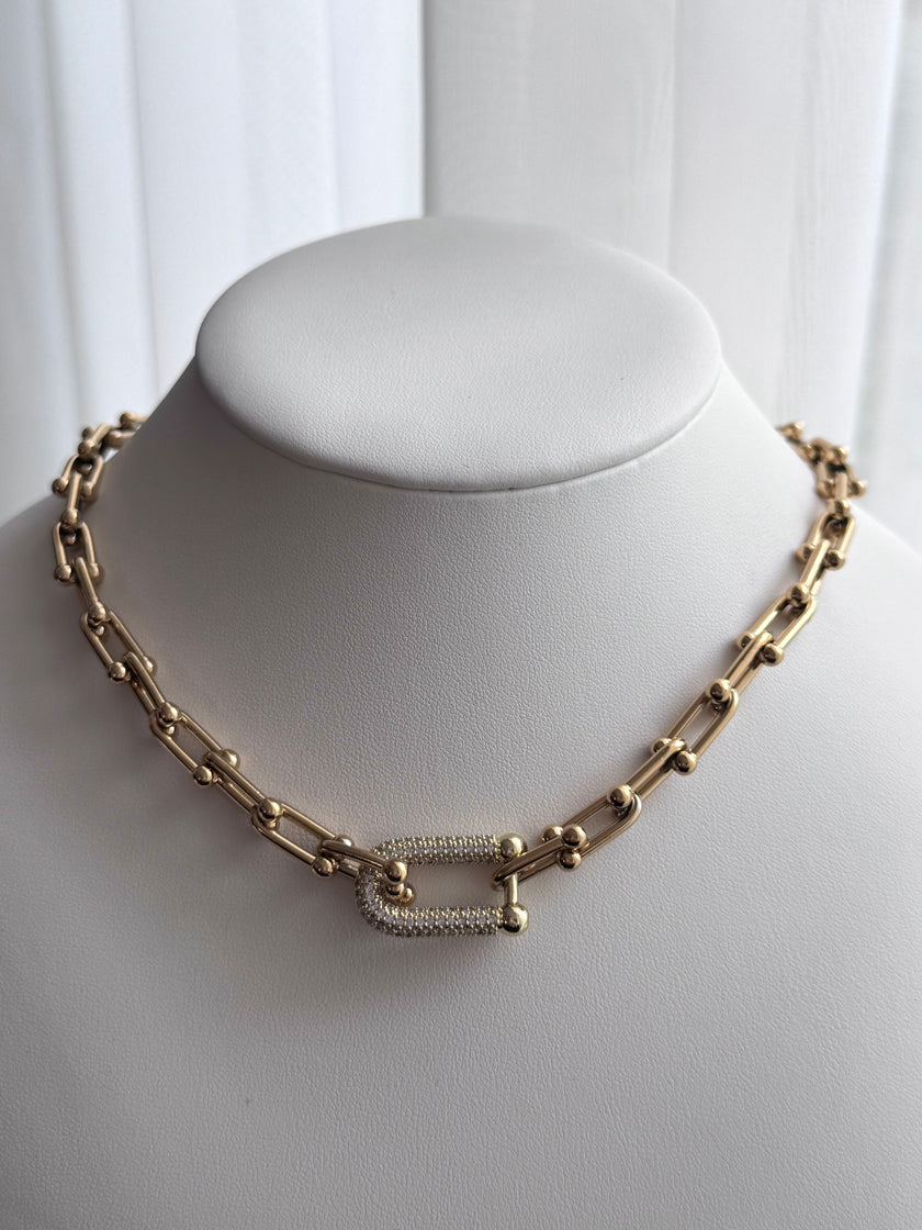 COLLAR ESLABÓN CON CRISTAL DORADO