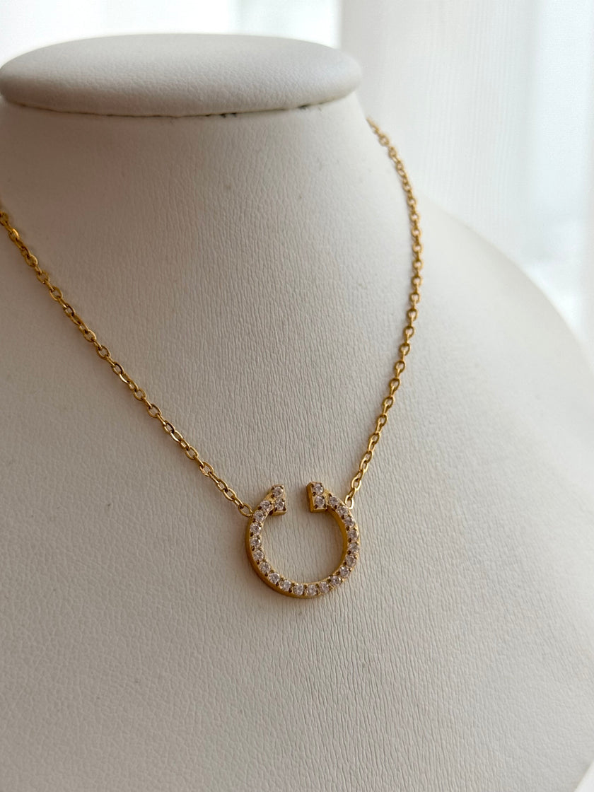 COLLAR T CON CRISTALES DORADO