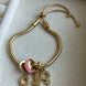 PULSERA CON CHARMS