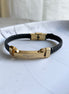 PULSERA TRENZADA CON PLACA