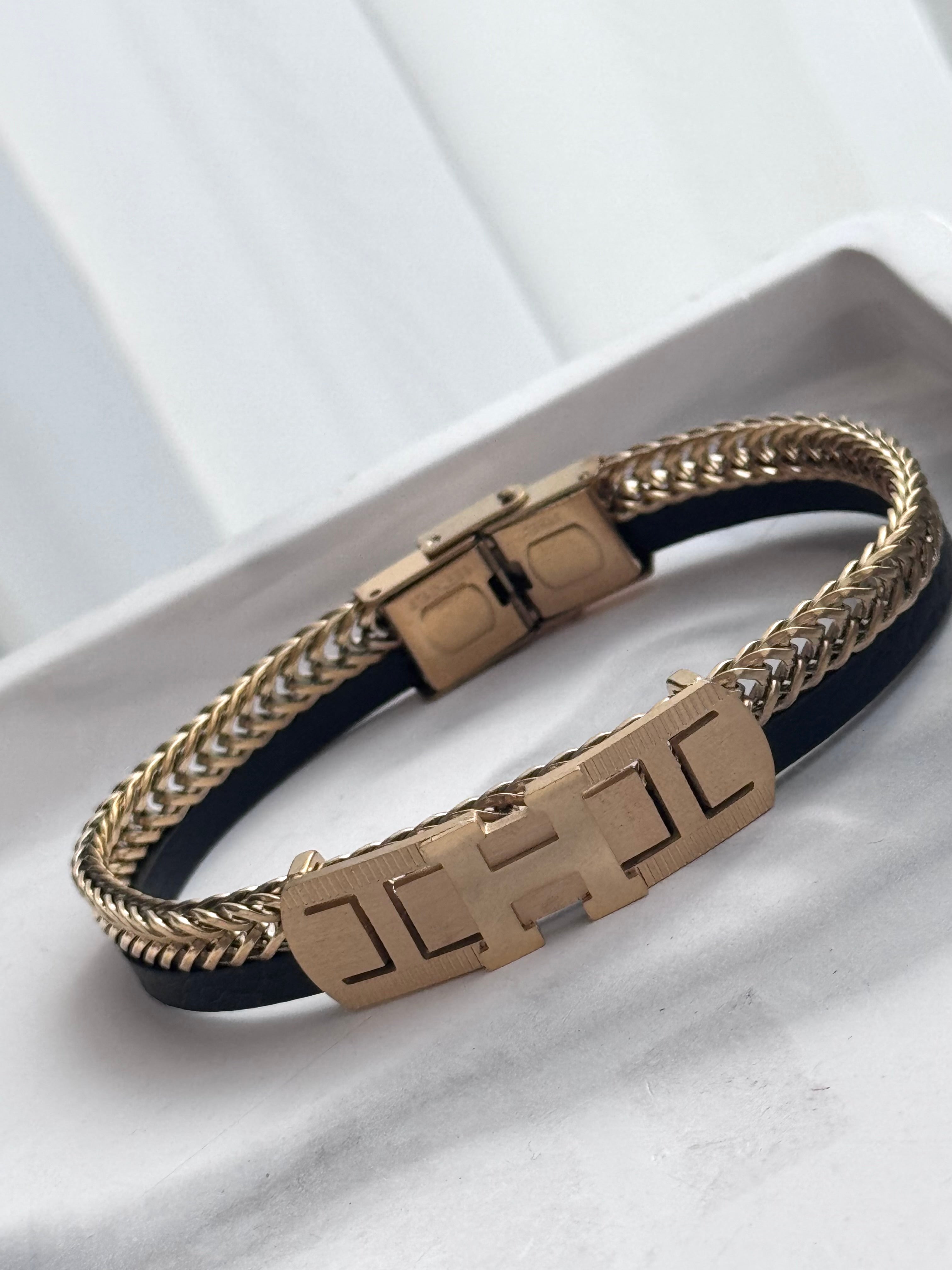 PULSERA PLACA H DORADA