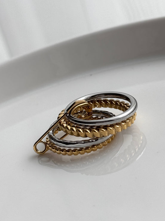 ANILLO CON BROCHE