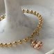 PULSERA BOLITAS CON OSO
