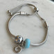 PULSERA CON CHARMS