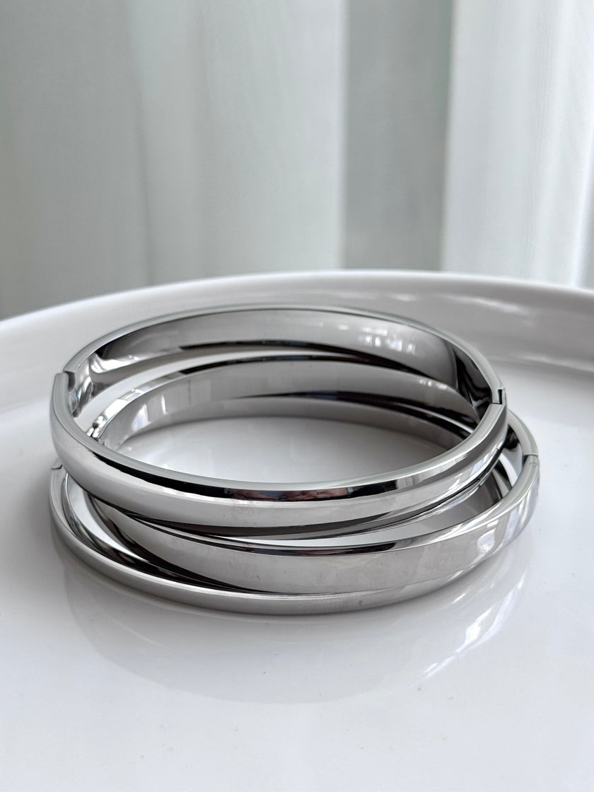 TRÍO DE BRAZALETES PLATEADO