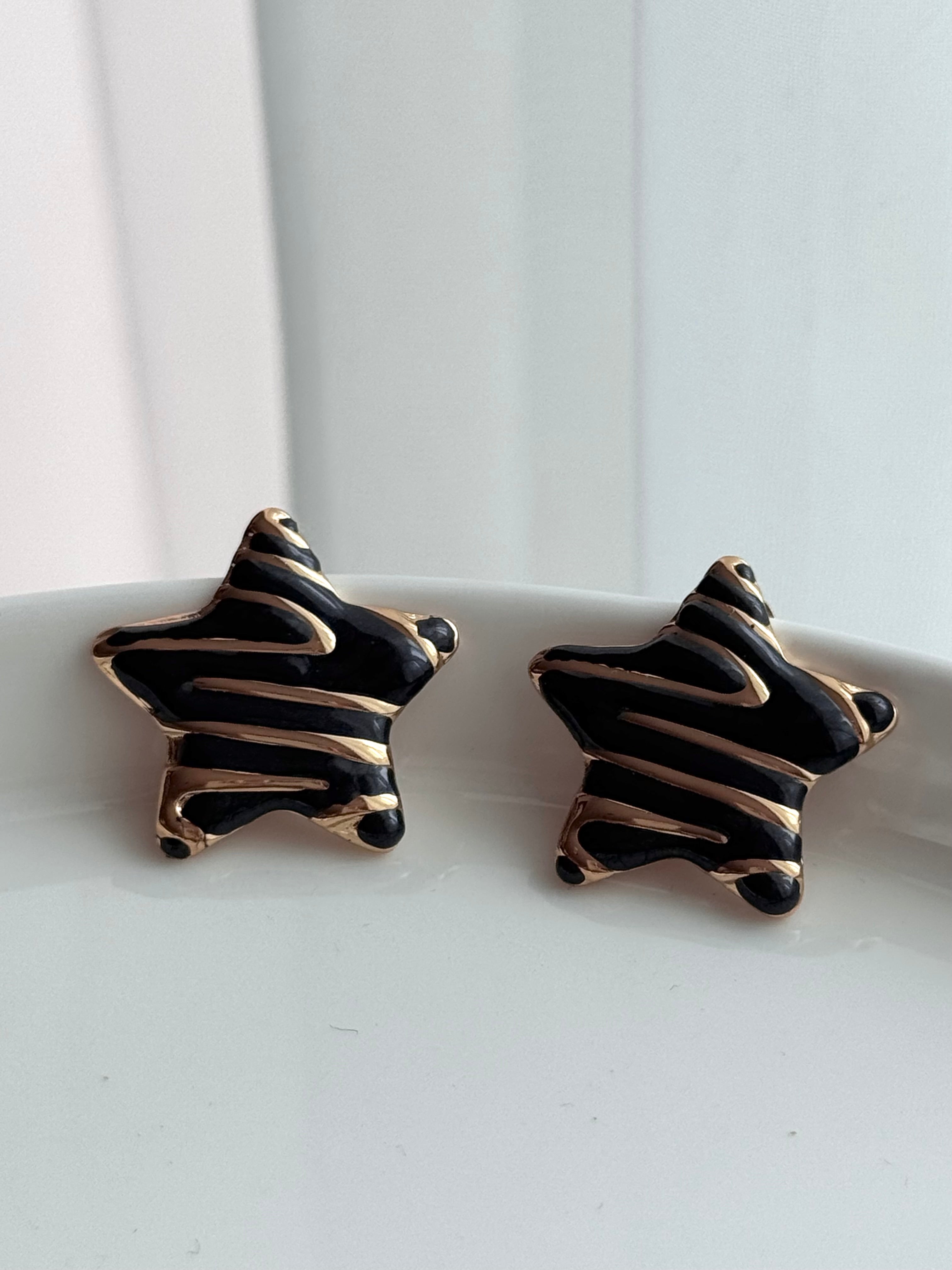 ARETE ESTRELLA NEGRO