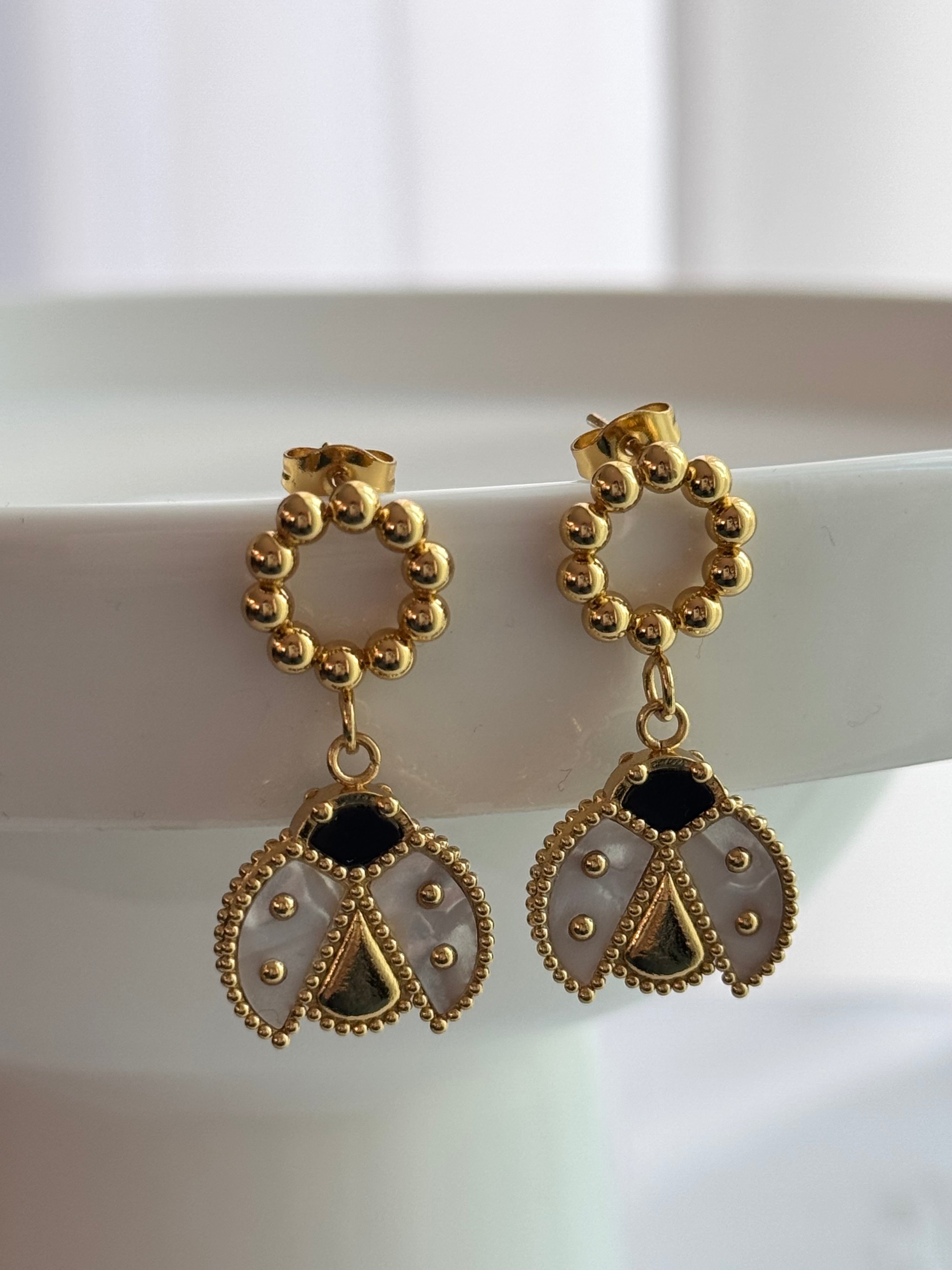 ARETE MARIQUITA ALA ABIERTA BLANCO