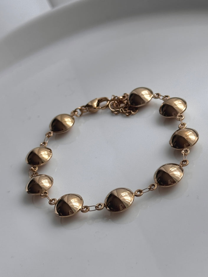 PULSERA GLOBO CÍRCULO