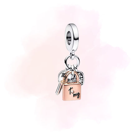 CHARM CANDADO Y LLAVE ROSA