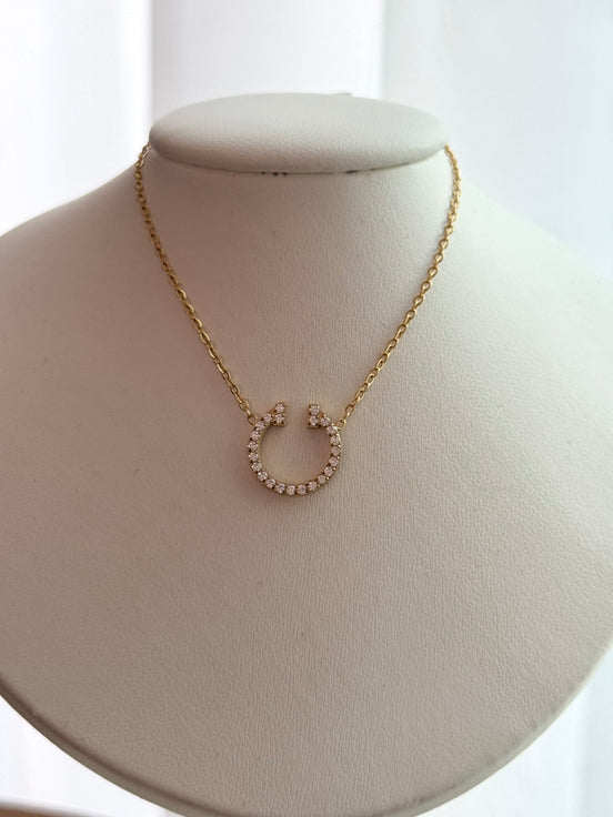 COLLAR T CON CRISTALES DORADO