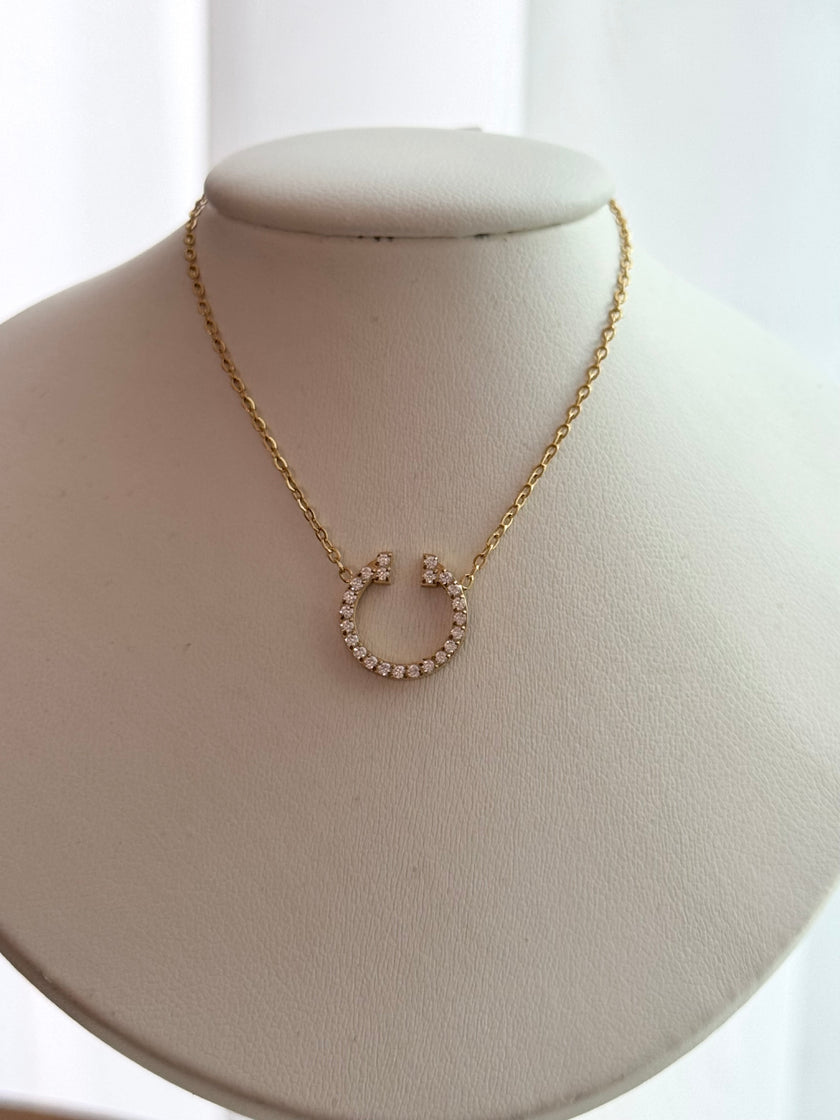 COLLAR T CON CRISTALES DORADO