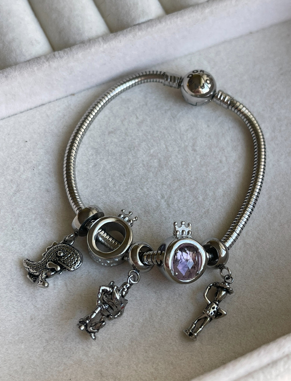 PULSERA CON CHARMS