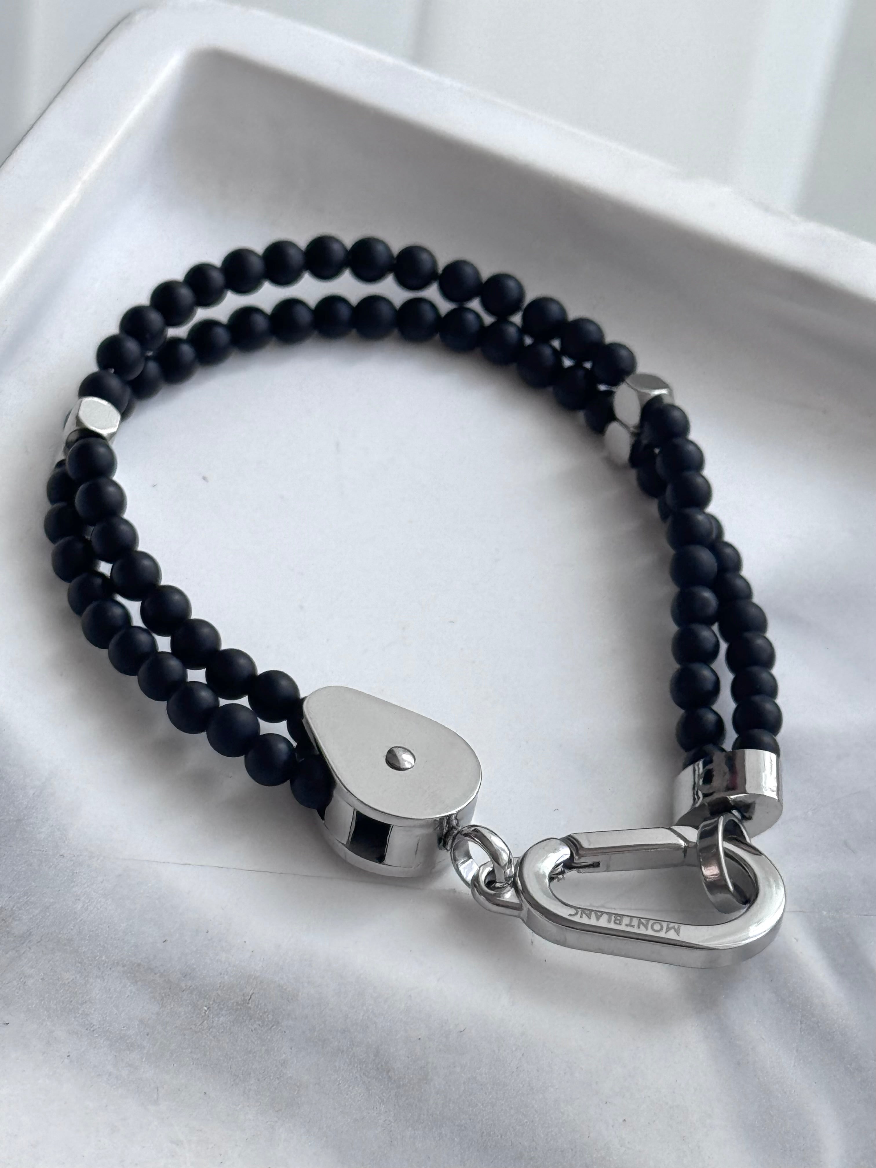 PULSERA BOLITAS NEGRAS