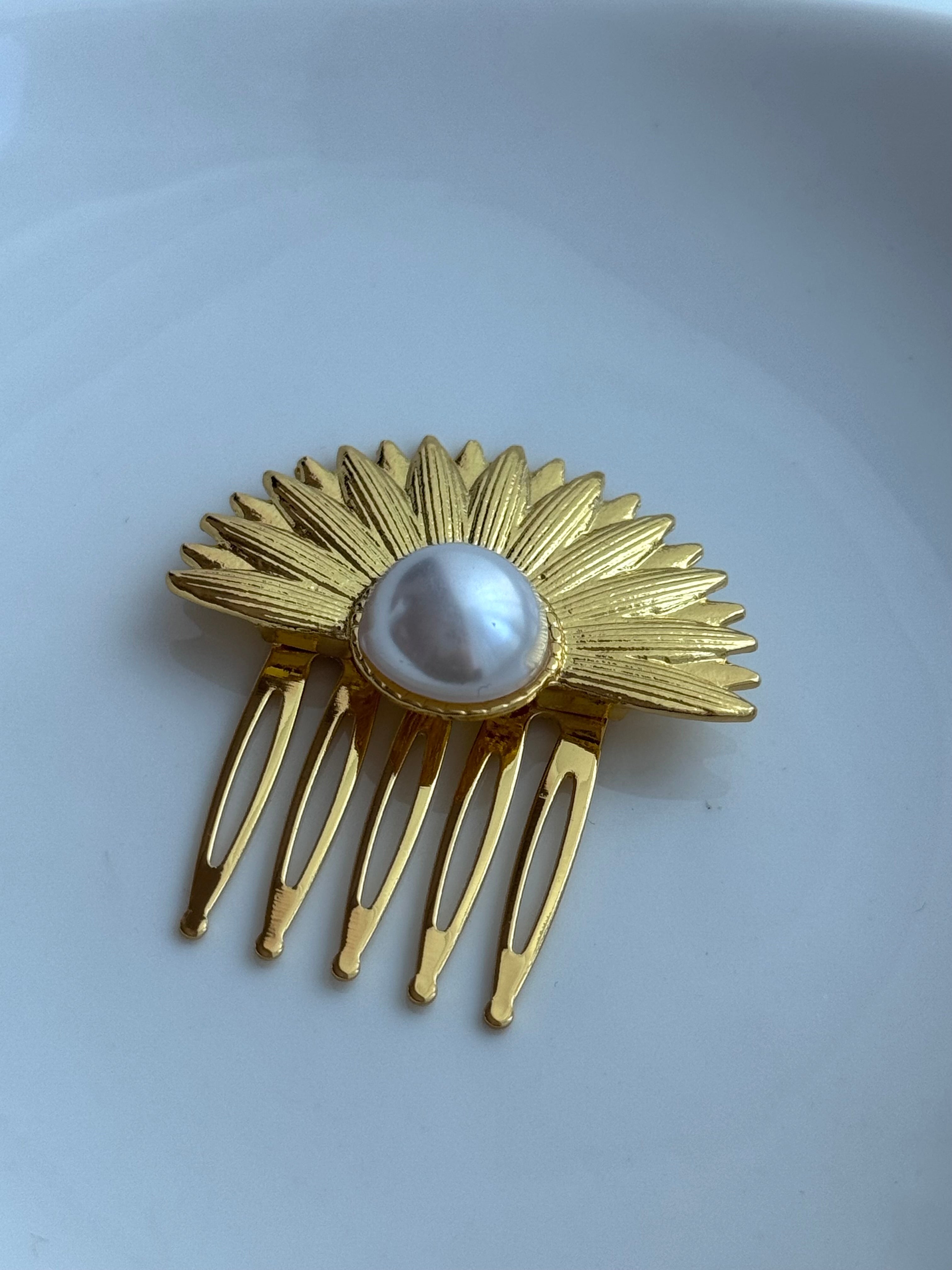 PINZA PARA EL CABELLO