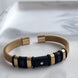 PULSERA ABIERTA DORADA
