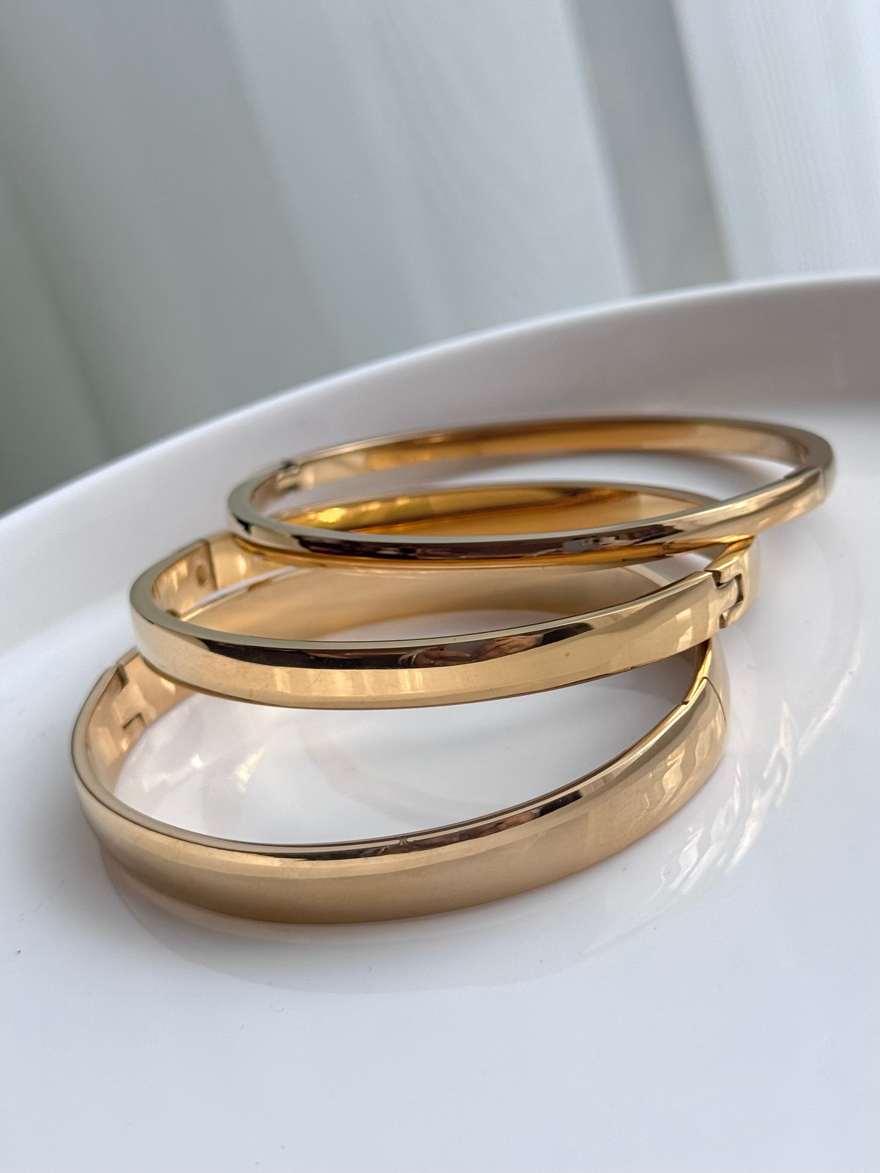 TRÍO DE BRAZALETES DORADO