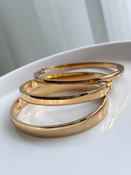 TRÍO DE BRAZALETES DORADO