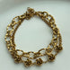 PULSERA DOBLE ROSAS