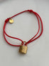 PULSERA HILO CANDADO LV ROJO