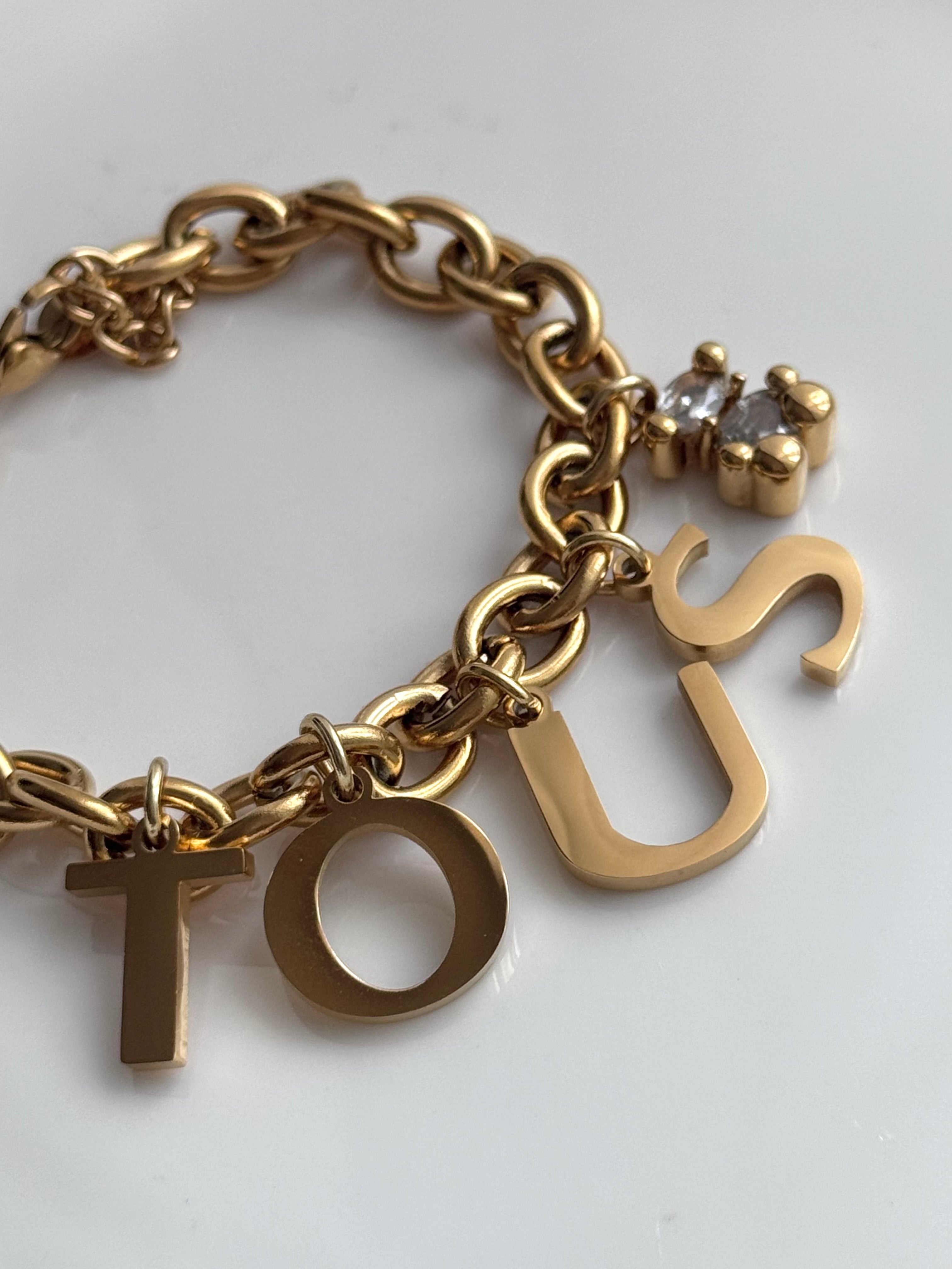 PULSERA LETRAS OSO BLANCO