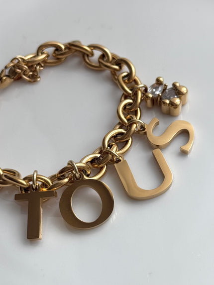 PULSERA LETRAS OSO BLANCO