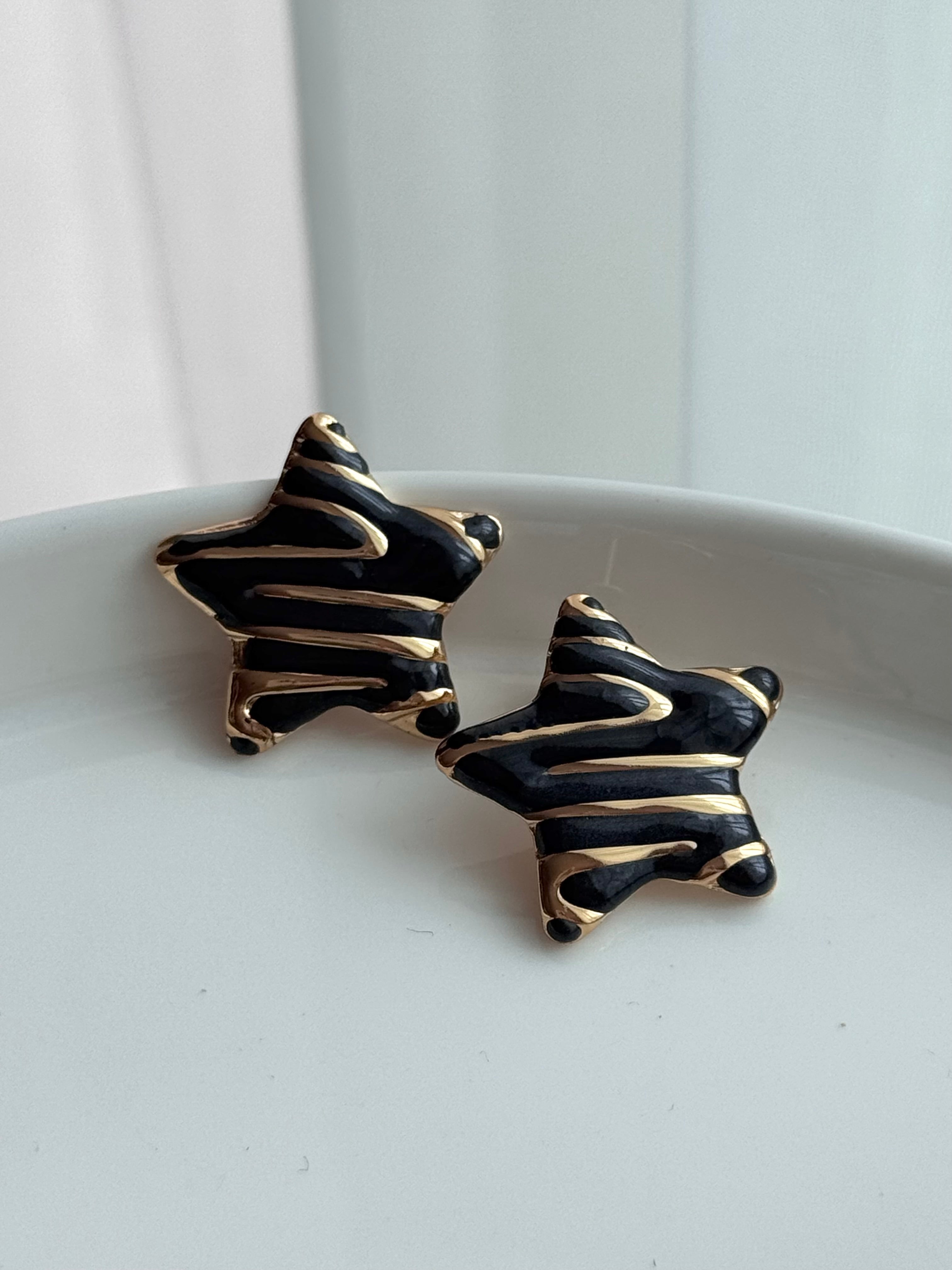 ARETE ESTRELLA NEGRO