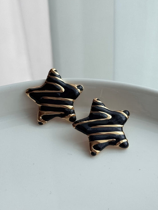 ARETE ESTRELLA NEGRO