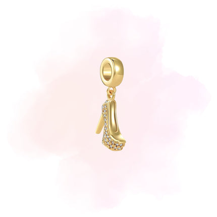 CHARM ZAPATILLA DORADA