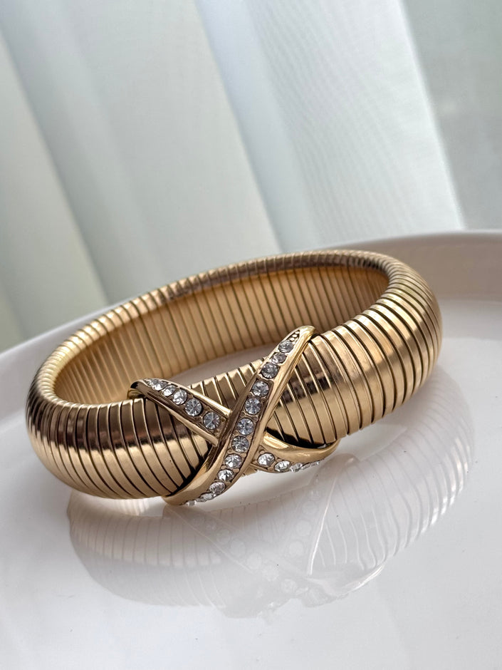 PULSERA GRUESA CRUZ DORADA