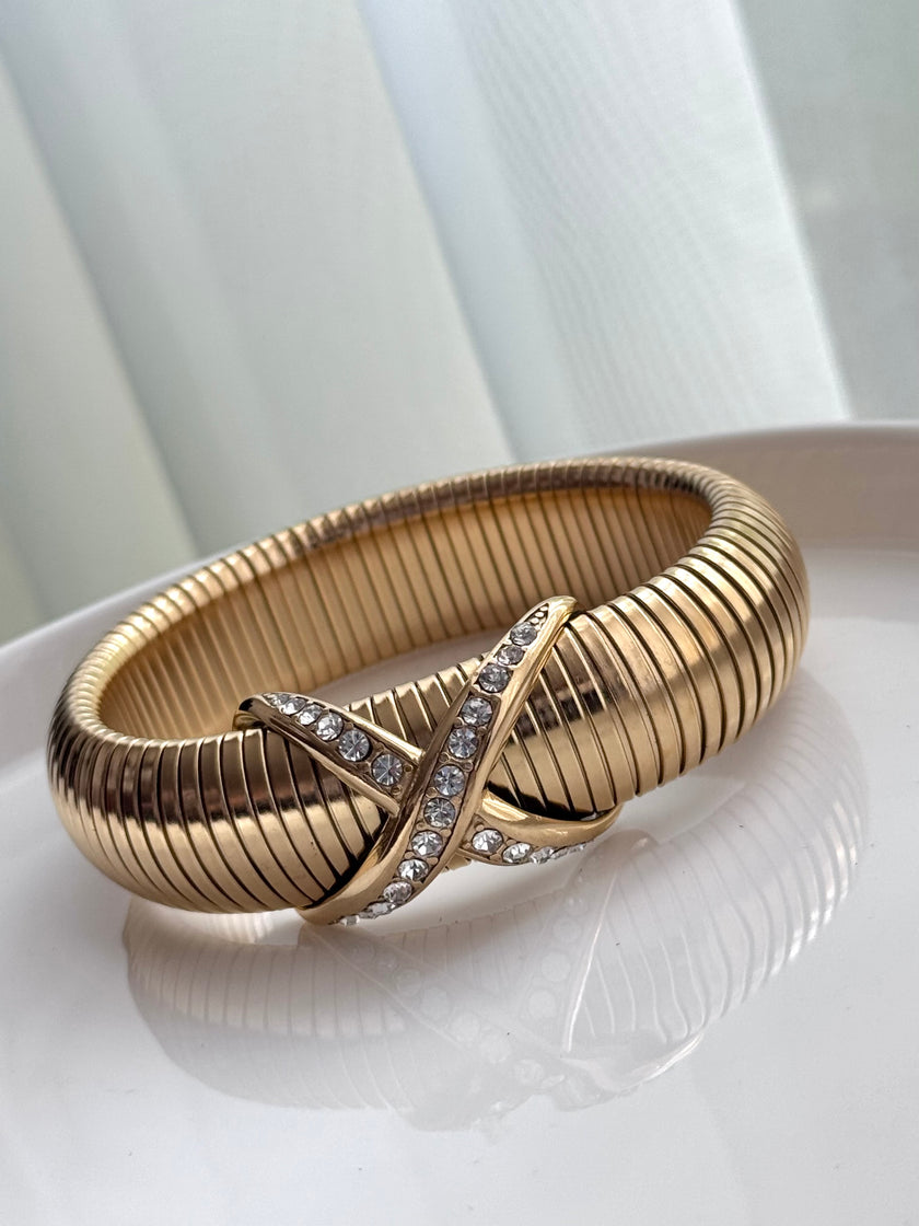 PULSERA GRUESA CRUZ DORADA