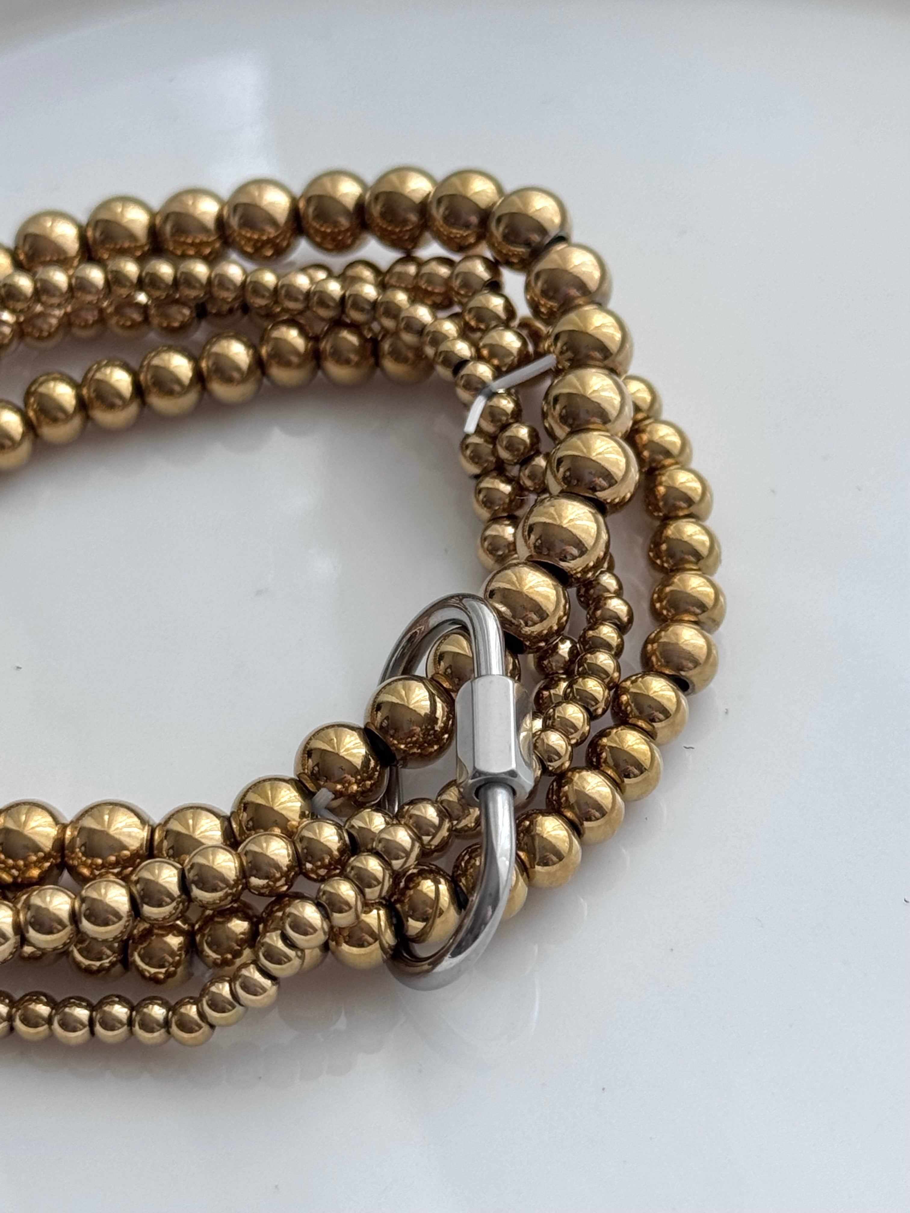 PULSERAS 4 BOLITAS CON HEBILLA