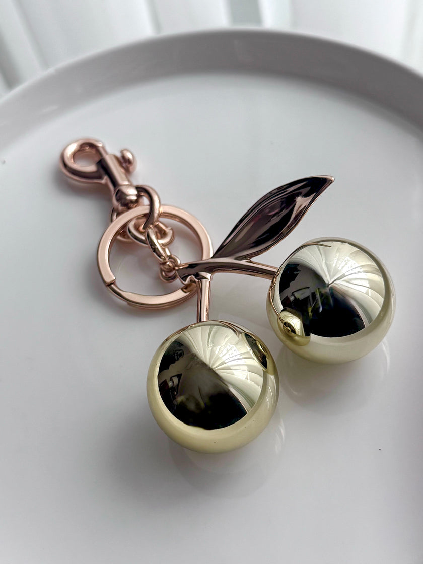 LLAVERO CEREZ DORADO