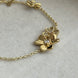 PULSERA FLOR TFNY
