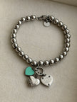 PULSERA BOLITAS CON DIJES