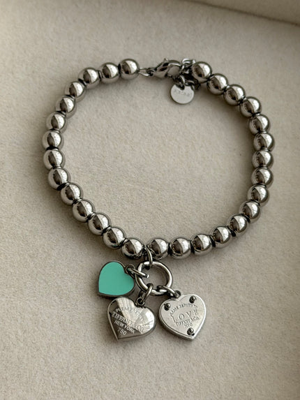 PULSERA BOLITAS CON DIJES