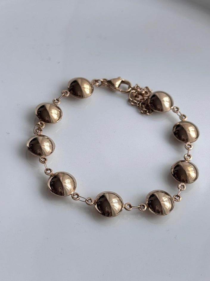 PULSERA GLOBO CÍRCULO