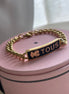 PULSERA CON PLACA
