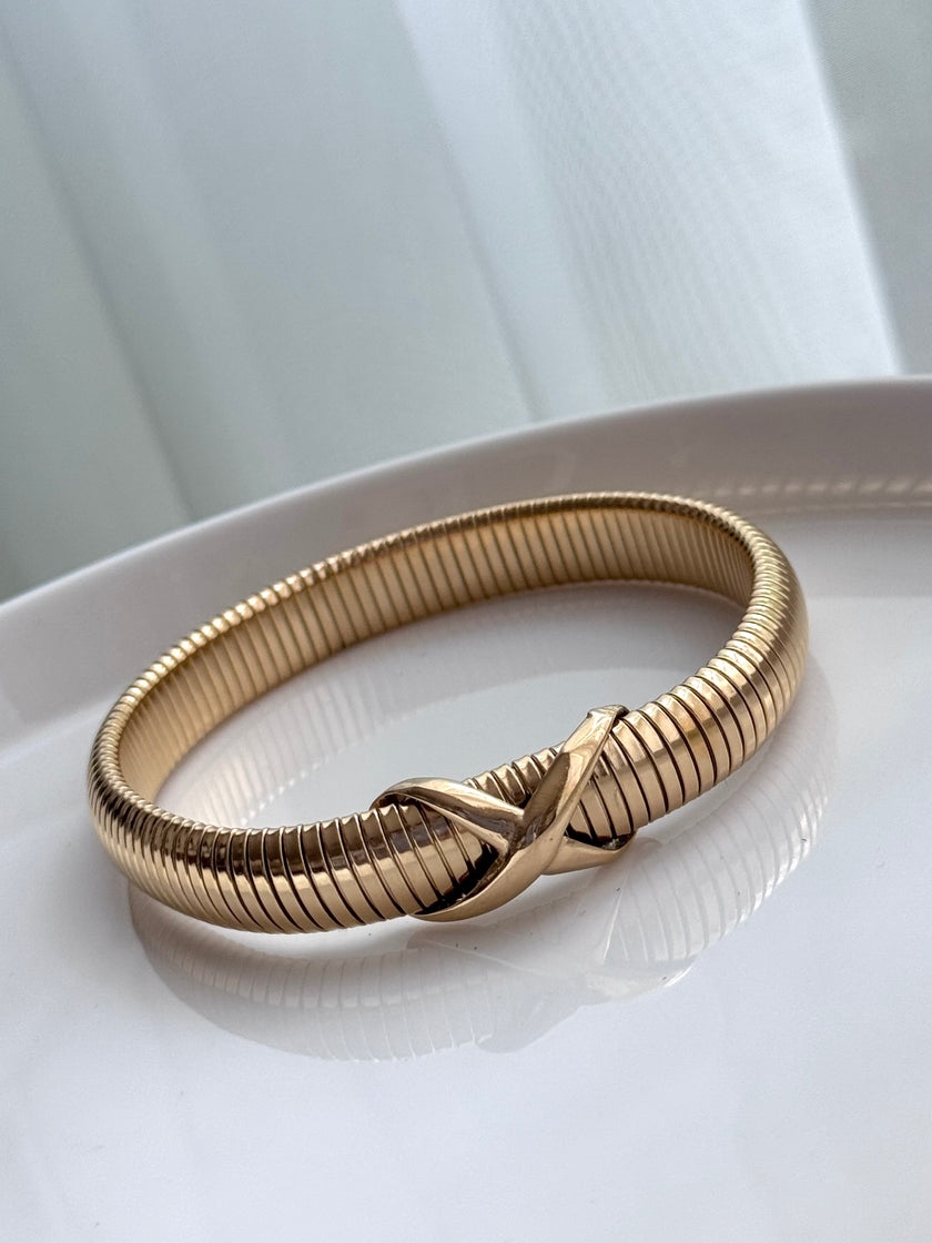 PULSERA CRUZ DELGADA DORADA